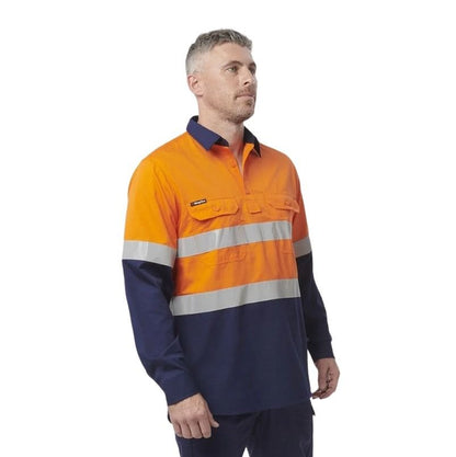 Man wearing a high-visibility orange and navy work shirt on a white background