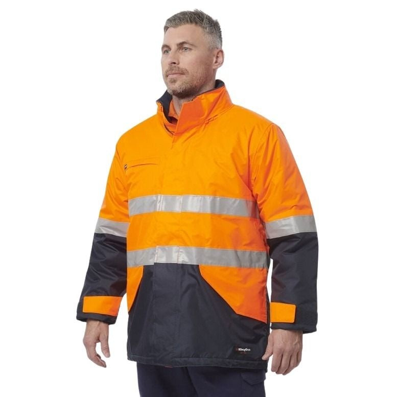 Man wearing an orange and black high-visibility jacket on a white background