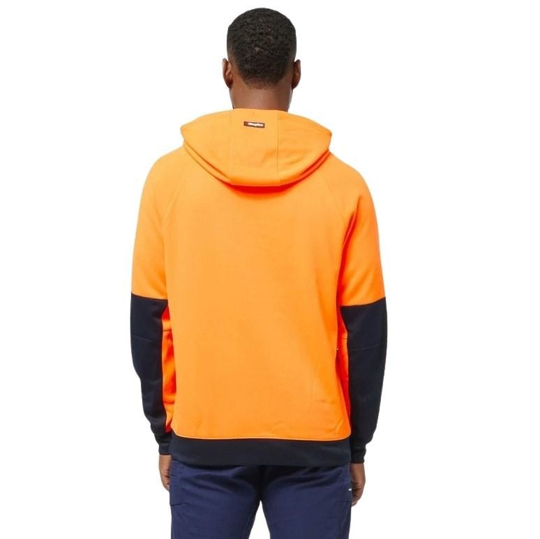 Person wearing an orange and navy hoodie on a white background