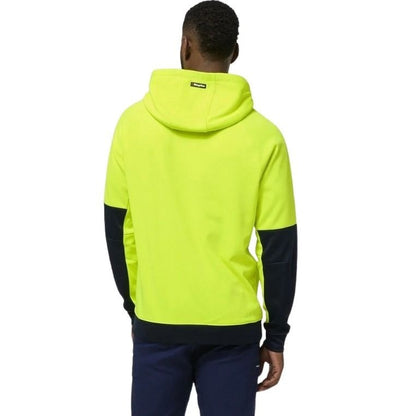 Person wearing a bright yellow hoodie with black sleeves on a white background