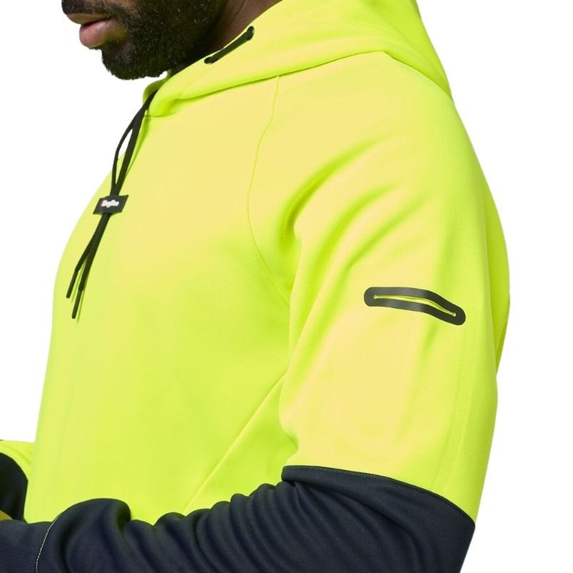 Close-up of a person wearing a bright yellow hoodie with black accents on a white background