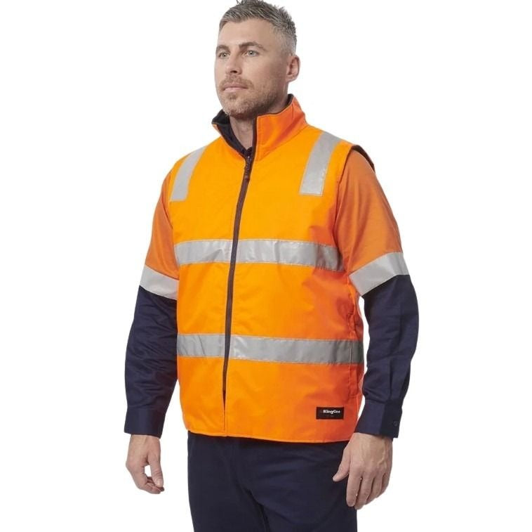 Man wearing an orange high-visibility jacket with reflective stripes on a white background