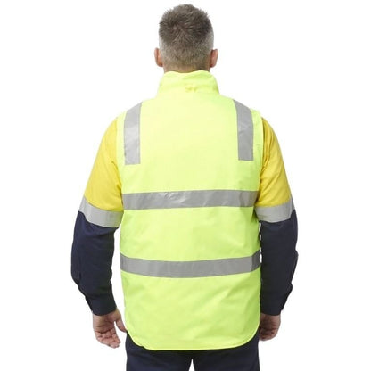 Person wearing a high-visibility jacket with reflective stripes on a white background