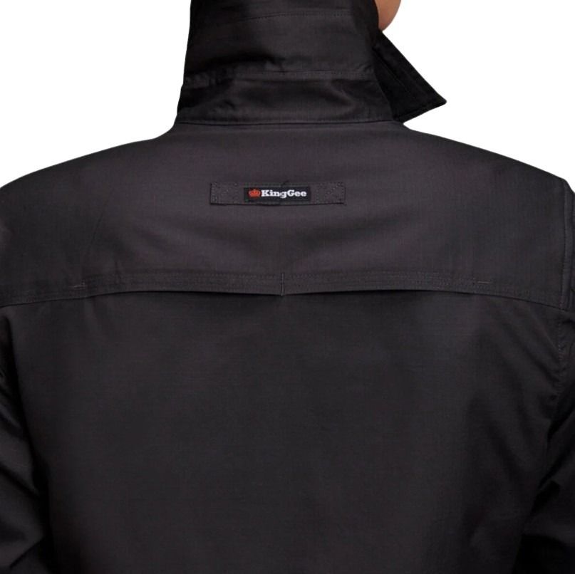 Black jacket with a brand logo on the chest against a white background