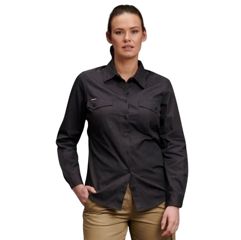 Woman wearing a black long-sleeve shirt on a white background