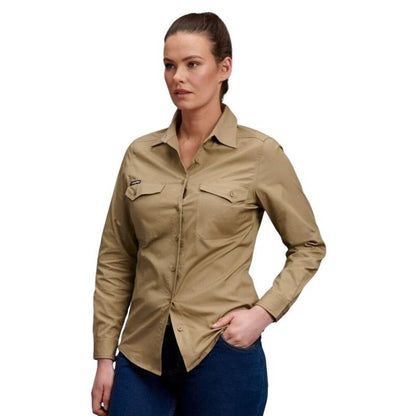 Woman wearing a beige shirt on a white background
