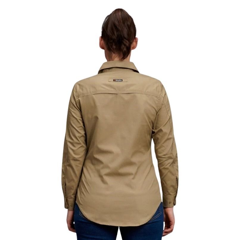 Person wearing a beige jacket on a white background