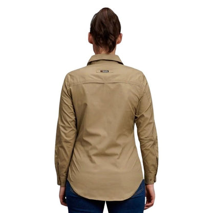 Person wearing a beige jacket on a white background