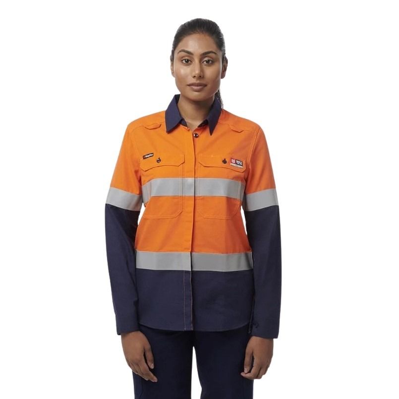 Person wearing an orange and navy work jacket with reflective stripes on a white background