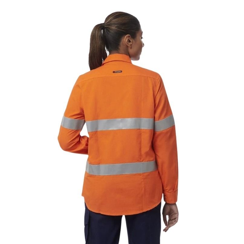 Person wearing an orange high-visibility work shirt on a white background
