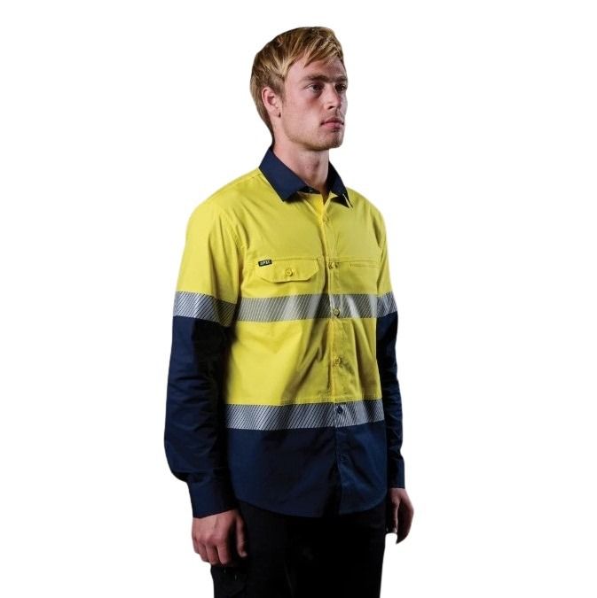 Person wearing a high-visibility yellow and navy work shirt on a white background