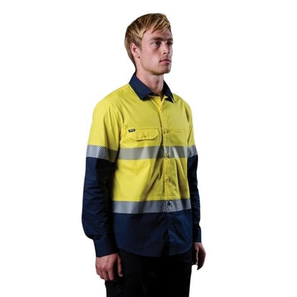 Person wearing a high-visibility yellow and navy work shirt on a white background