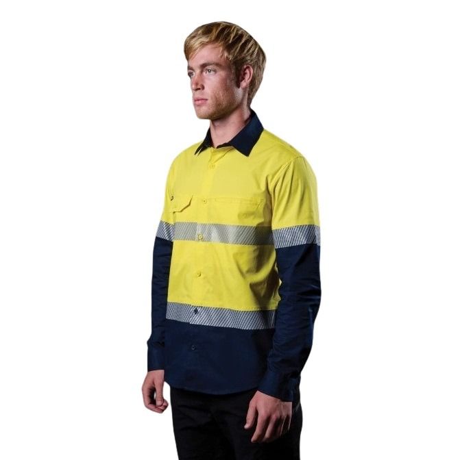 Person wearing a yellow and navy high-visibility work shirt on a white background