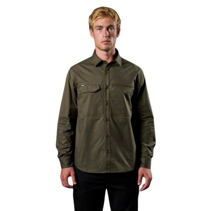 Man wearing a green shirt on a white background