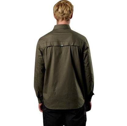 Person wearing a green jacket on a white background