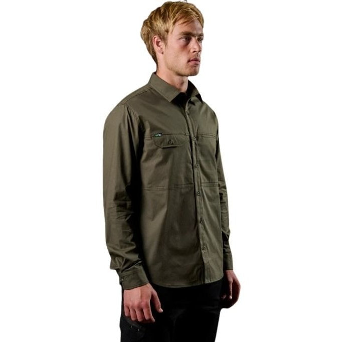 Man wearing a green shirt on a white background