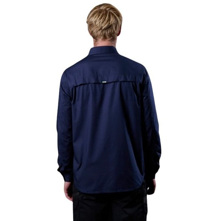 Person wearing a navy blue long-sleeve shirt on a white background