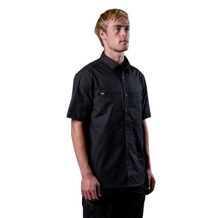 Man wearing a black short-sleeve shirt on a white background
