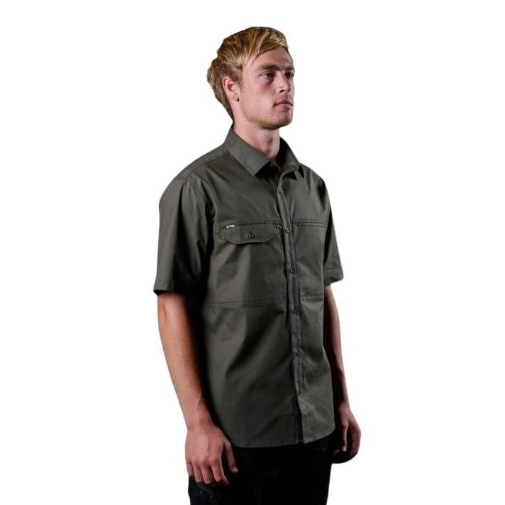 Man wearing a green short-sleeve shirt on a white background
