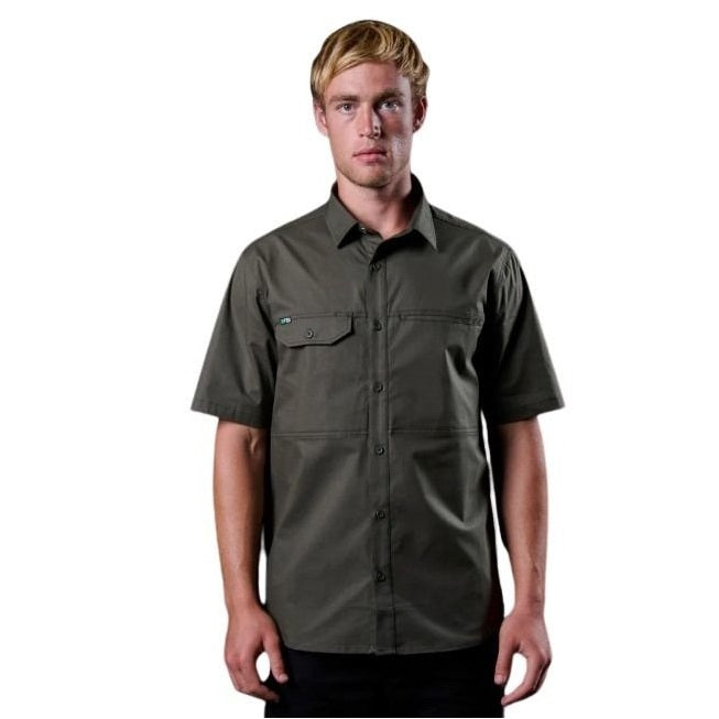 Man wearing a dark green short-sleeve shirt on a white background