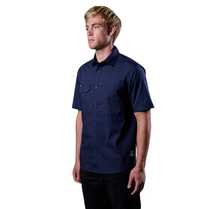 Man wearing a navy blue short-sleeve shirt on a white background