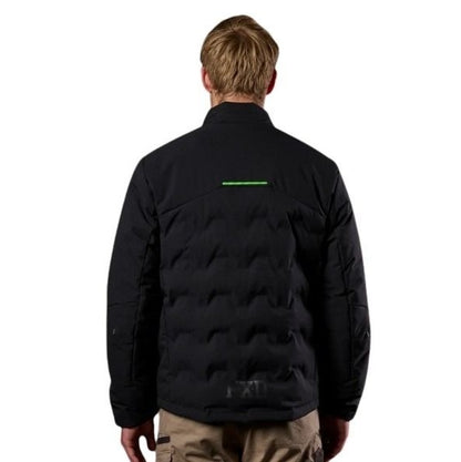 Person wearing a black jacket with a green stripe on the back, standing against a white background
