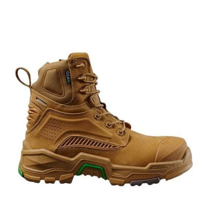 Tan boot with green sole on a white background