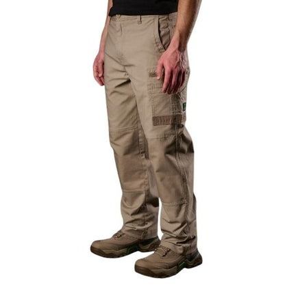 Person wearing beige cargo pants on a white background