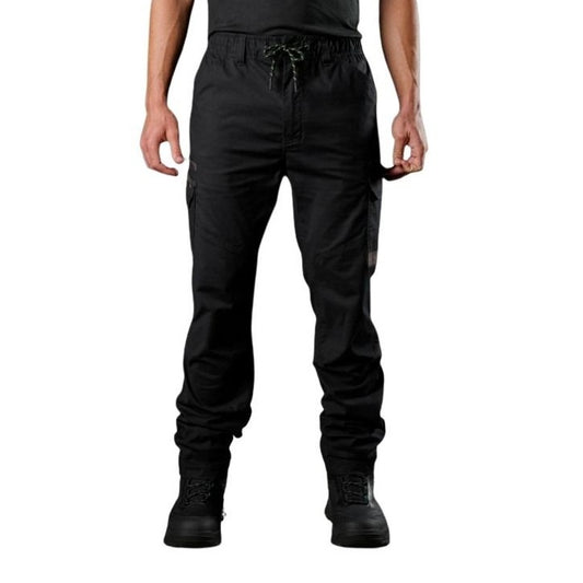 Person wearing black cargo pants on a white background