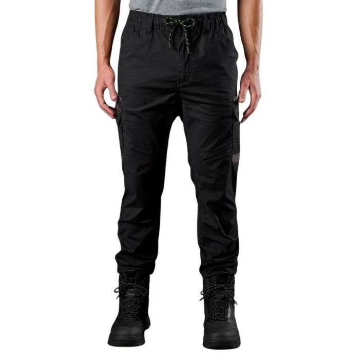 Person wearing black cargo pants on a white background