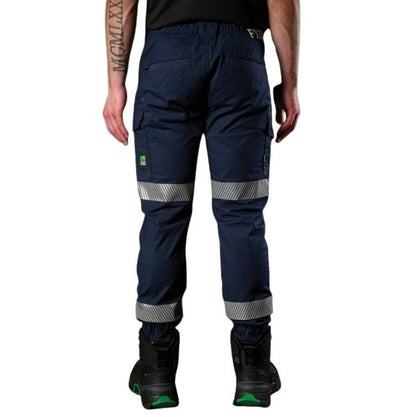 Navy work pants with reflective stripes worn by a person on a white background