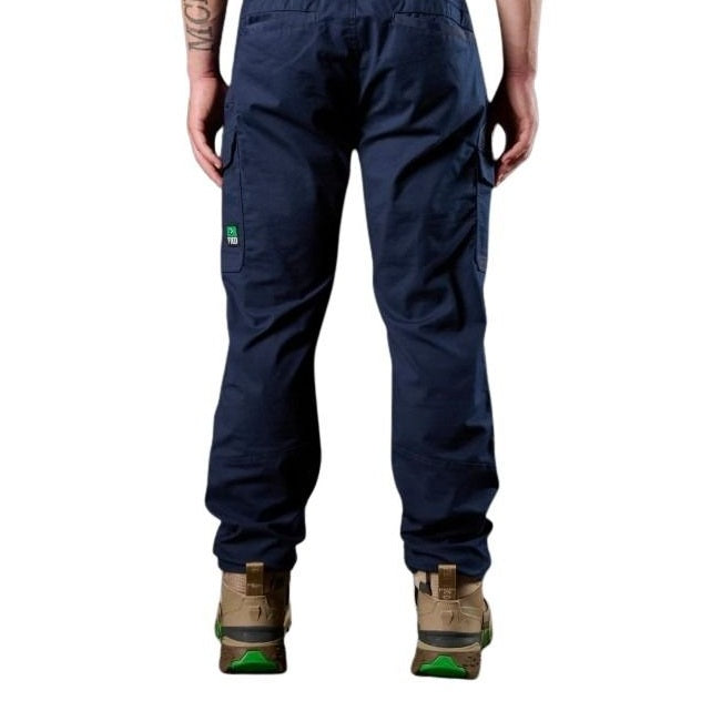 Navy blue cargo pants worn by a person on a white background