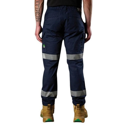 Navy work pants with reflective stripes worn by a person on a white background