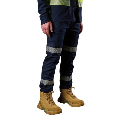 Navy work pants with reflective stripes and tan boots on a white background