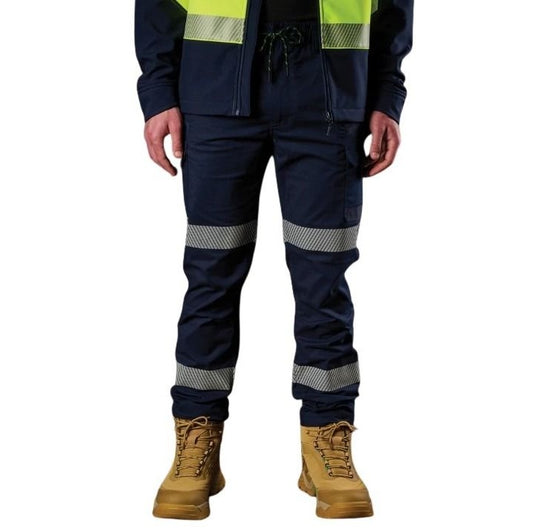 Navy work pants with reflective stripes and tan boots on a white background