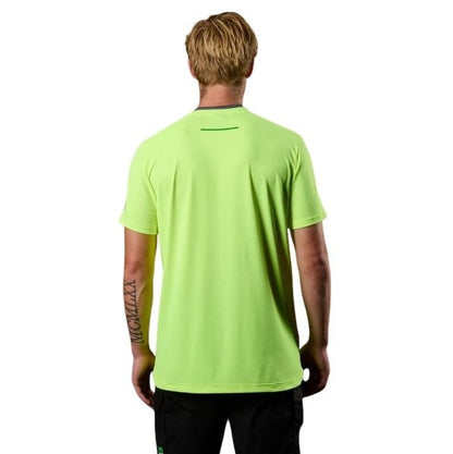 Person wearing a bright green t-shirt on a white background