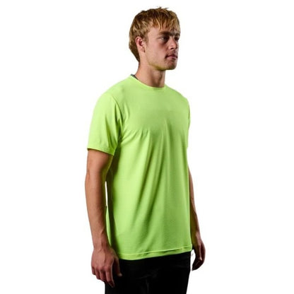 Man wearing a bright green t-shirt on a white background