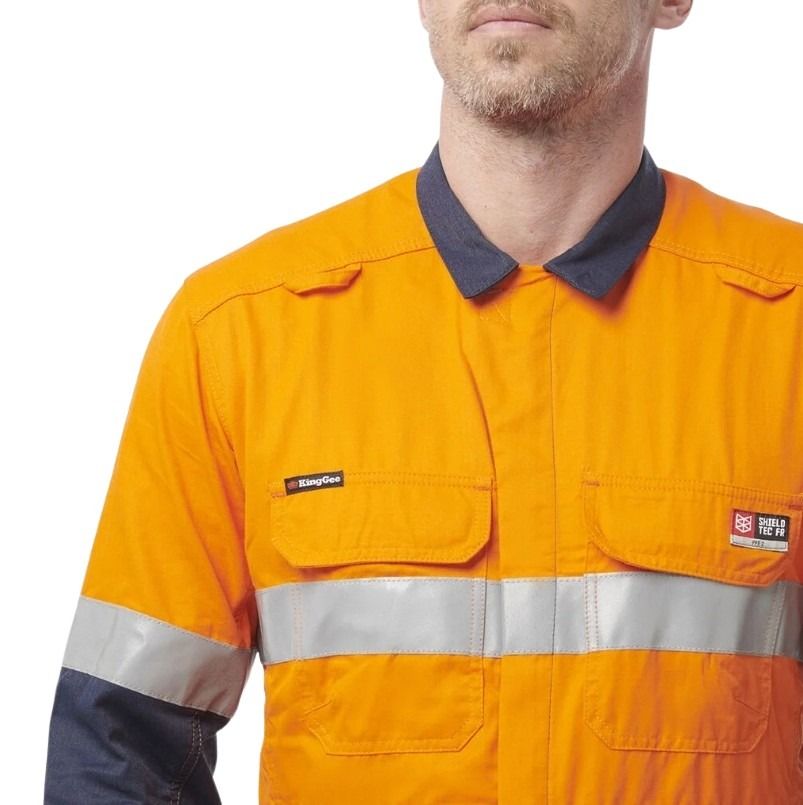 Orange work shirt with reflective stripes and brand logo on a white background
