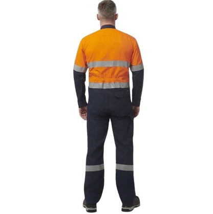 Person wearing an orange and navy high-visibility work uniform on a white background