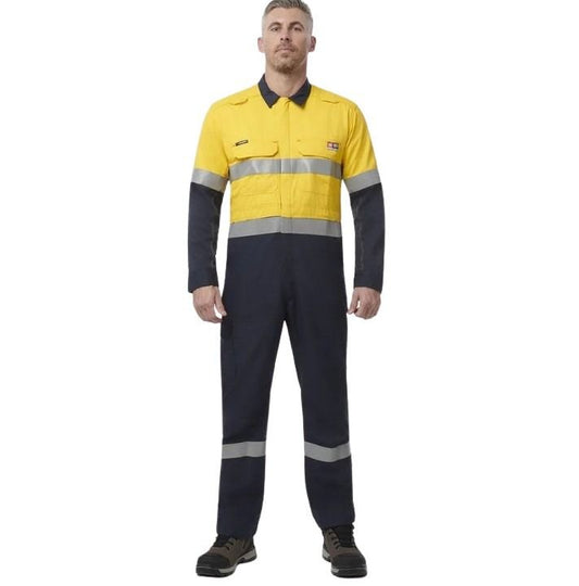 Person wearing a yellow and navy work jumpsuit with reflective stripes on a white background