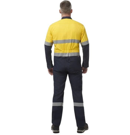 Person wearing a yellow and navy work uniform with reflective stripes on a white background