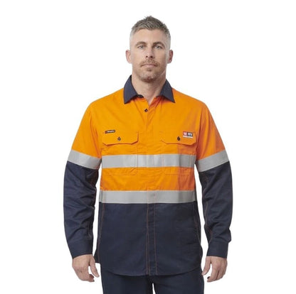 Man wearing a high-visibility orange and navy work shirt on a white background