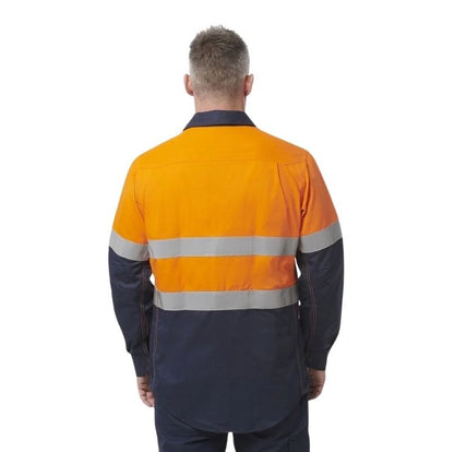 Person wearing a high-visibility orange and navy work shirt on a white background