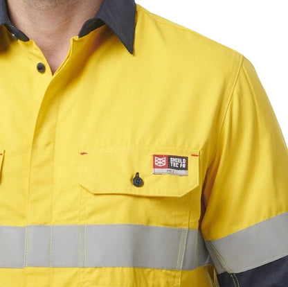 Yellow work shirt with reflective stripes and a visible brand logo on a white background