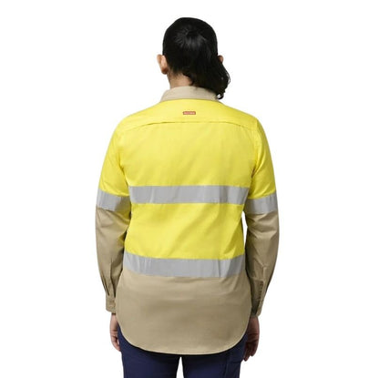 Person wearing a yellow and beige high-visibility work shirt on a white background