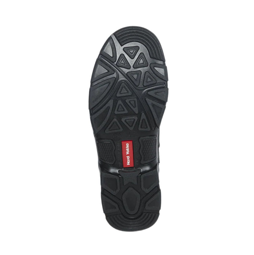 Black shoe sole with a red label on a white background