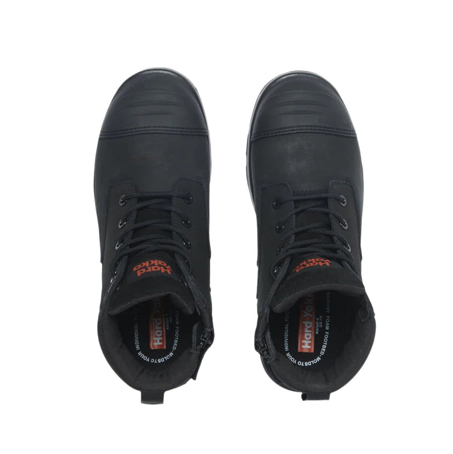 Pair of black high-top sneakers on a white background